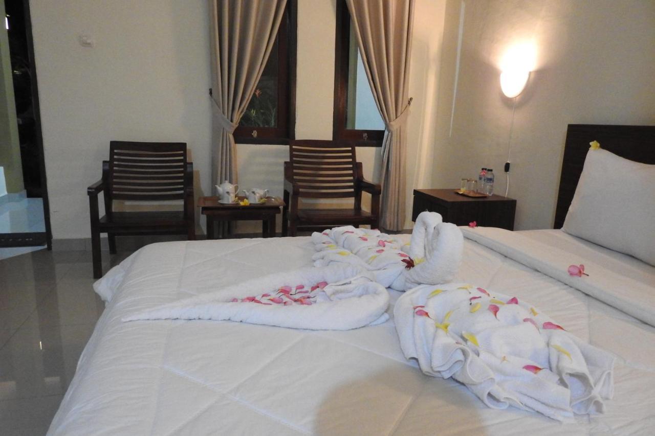 D'Batur Hotel Senggigi Bagian luar foto